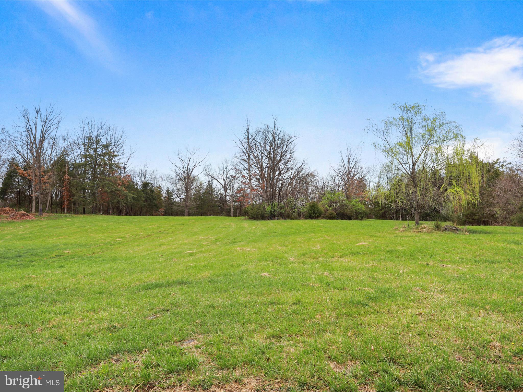 Summit Point Rd Summit Point Summit Point, WV 25446 - Photo 18 of 26 a view of a field of grass and trees