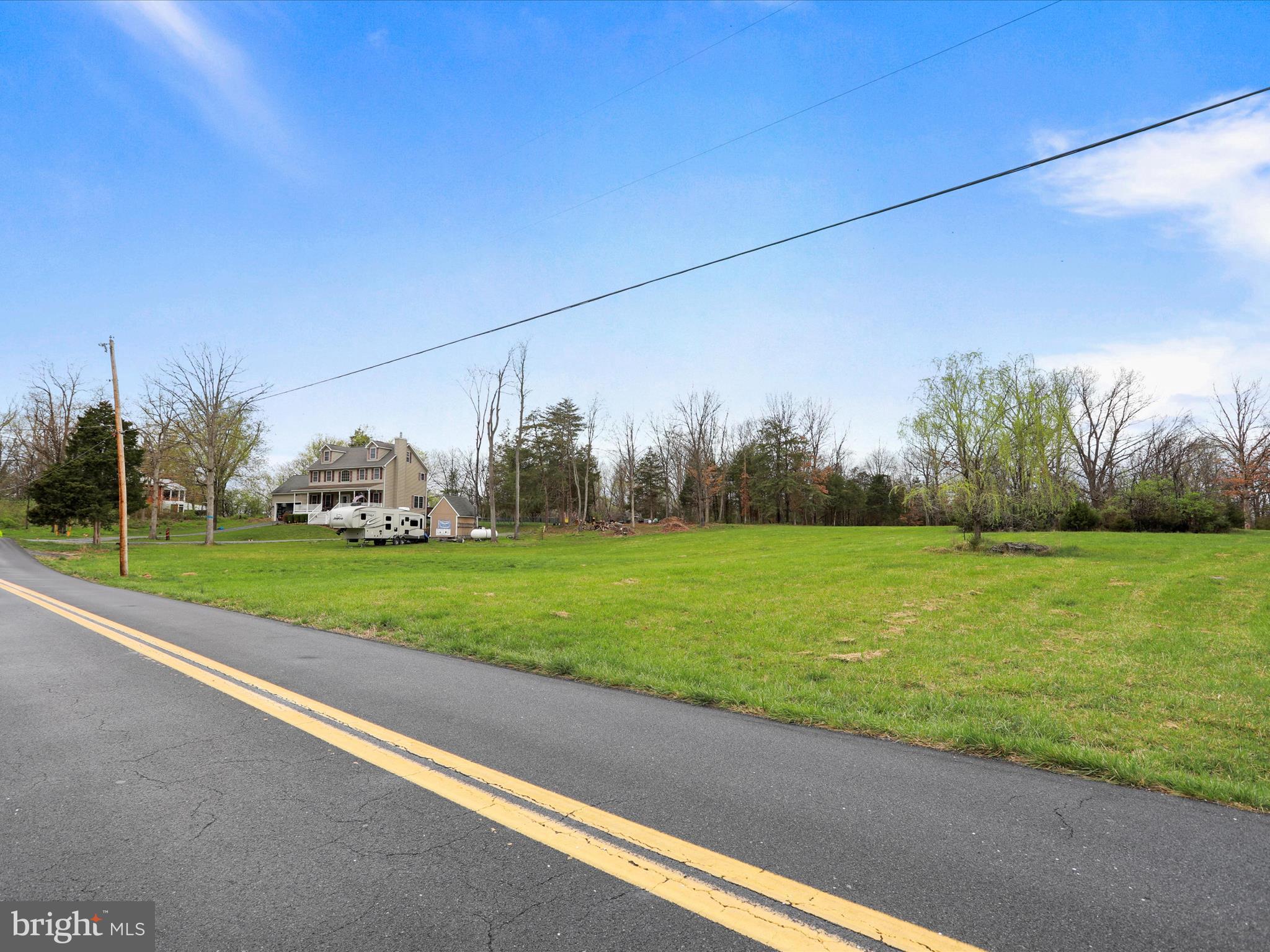 Summit Point Rd Summit Point Summit Point, WV 25446 - Photo 24 of 26 a view of a field of grass and trees