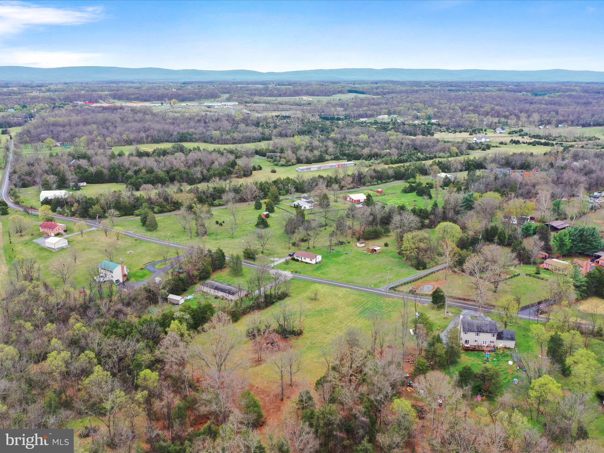 Summit Point Rd Summit Point Summit Point, WV 25446 - Photo 4 of 26 an aerial view of house with yard and mountain view in back