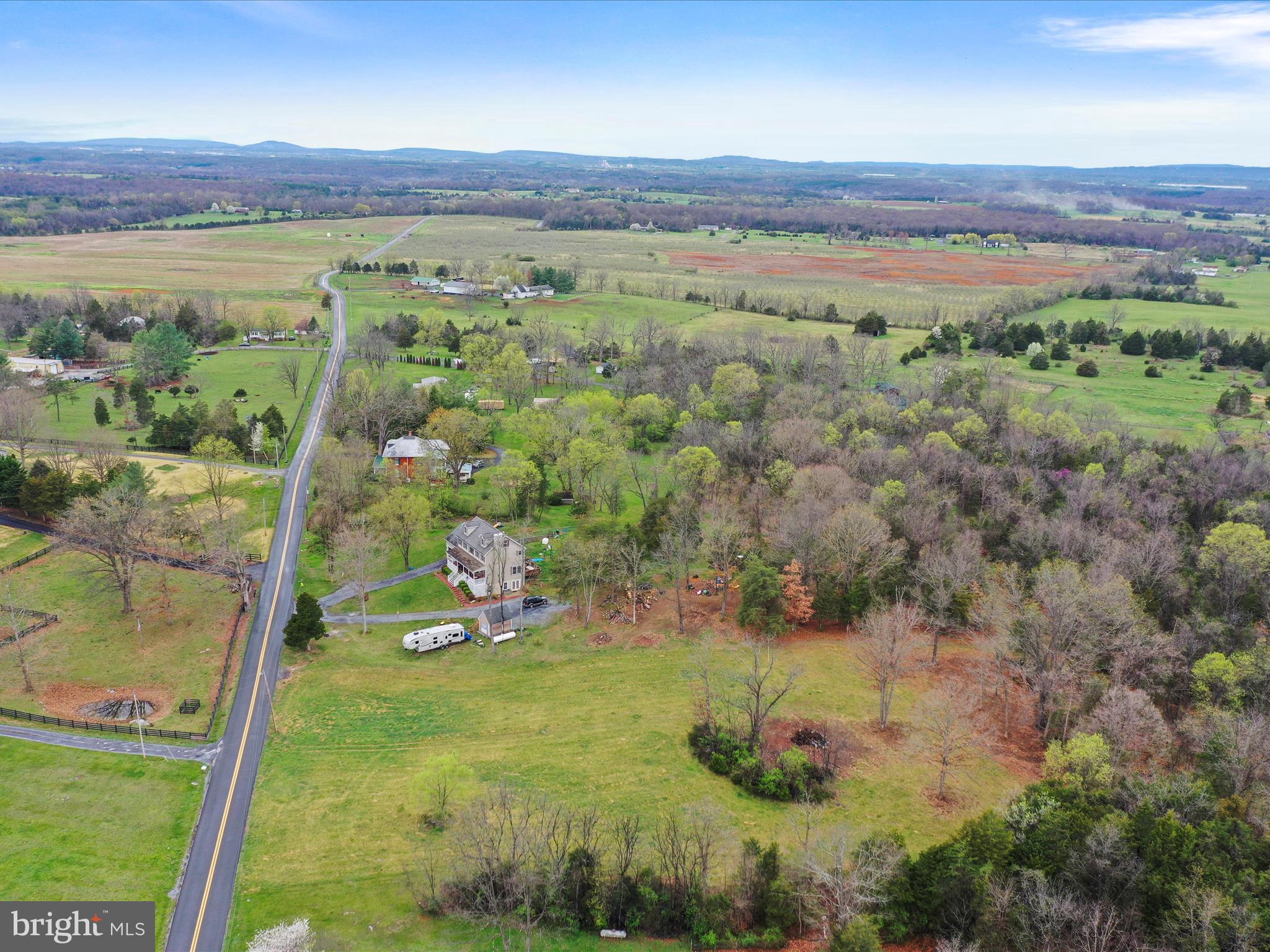 Summit Point Rd Summit Point Summit Point, WV 25446 - Photo 8 of 26 a view of a lush green field