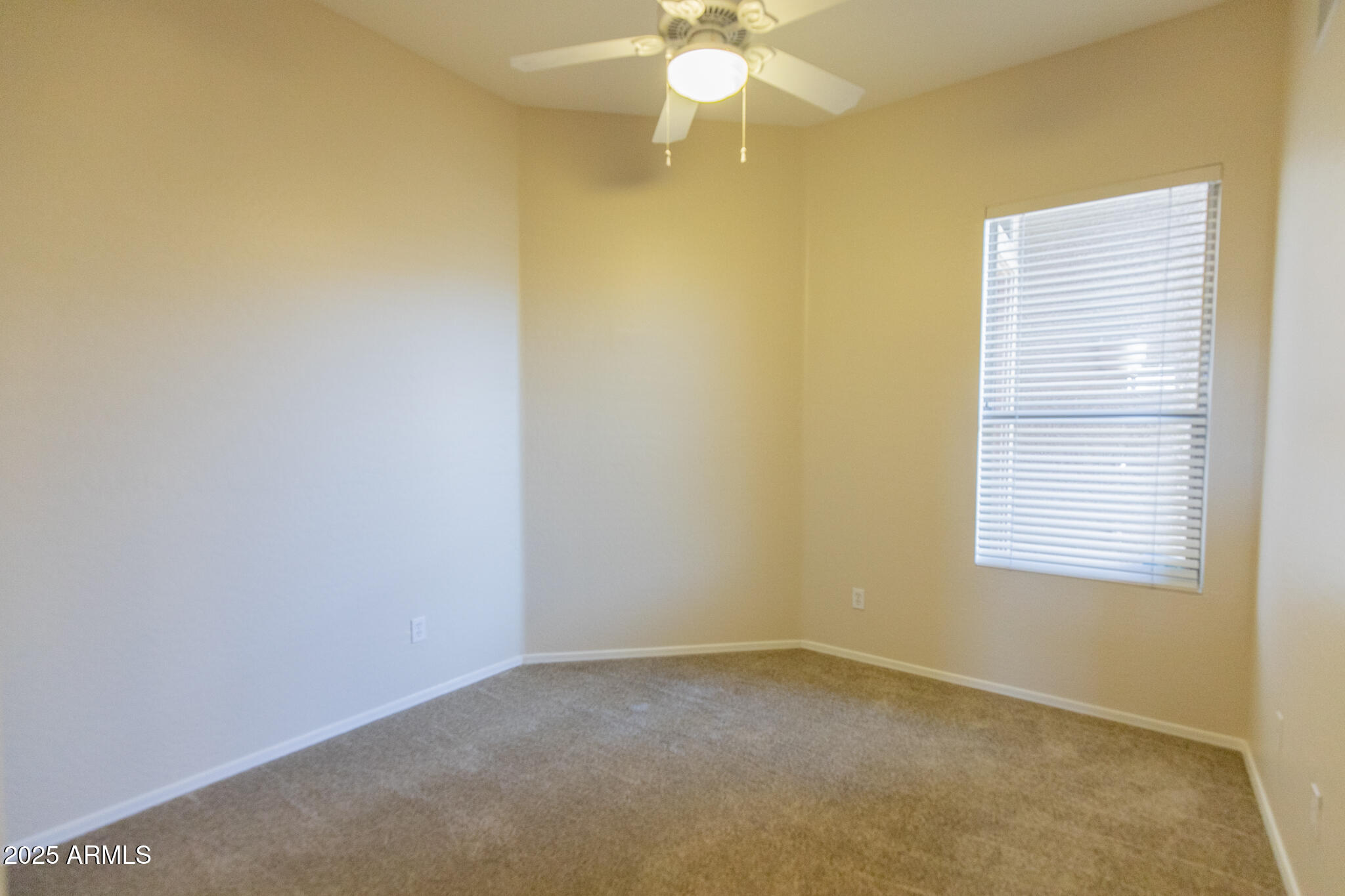 770 West Aloe Place Chandler, AZ 85248 - Photo 16 of 28 an empty room with a window