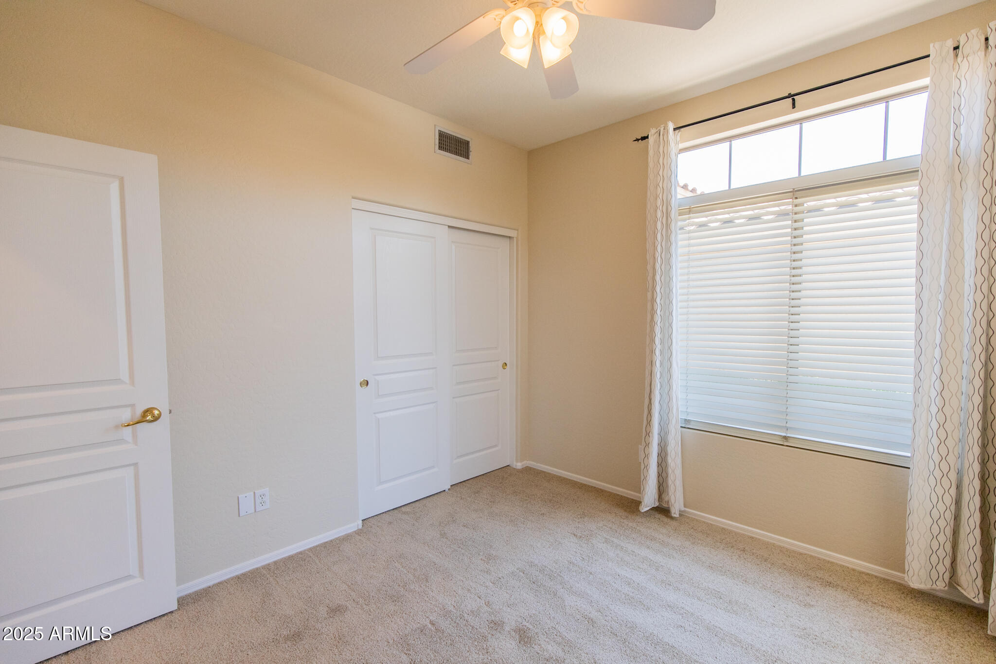 770 West Aloe Place Chandler, AZ 85248 - Photo 17 of 28 a view of an empty room with a window
