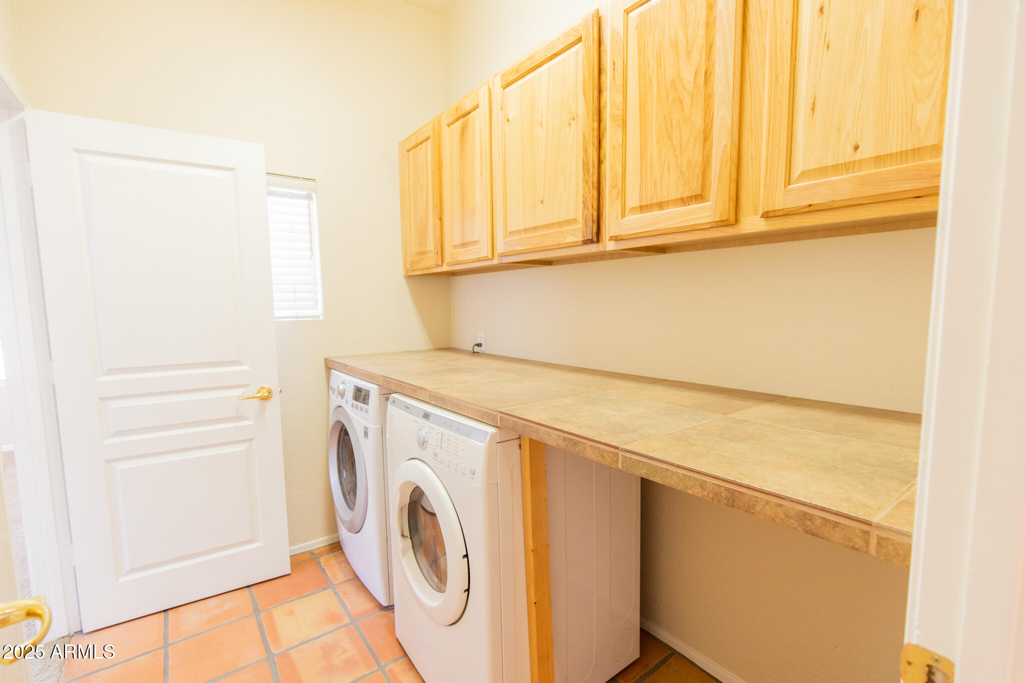 770 West Aloe Place Chandler, AZ 85248 - Photo 22 of 28 a utility room with dryer and washer