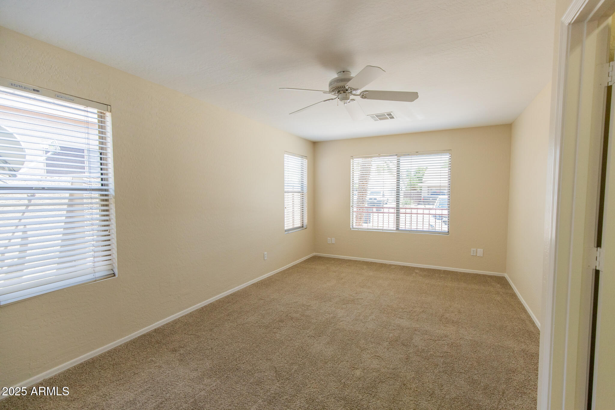 770 West Aloe Place Chandler, AZ 85248 - Photo 23 of 28 a view of an empty room with a window