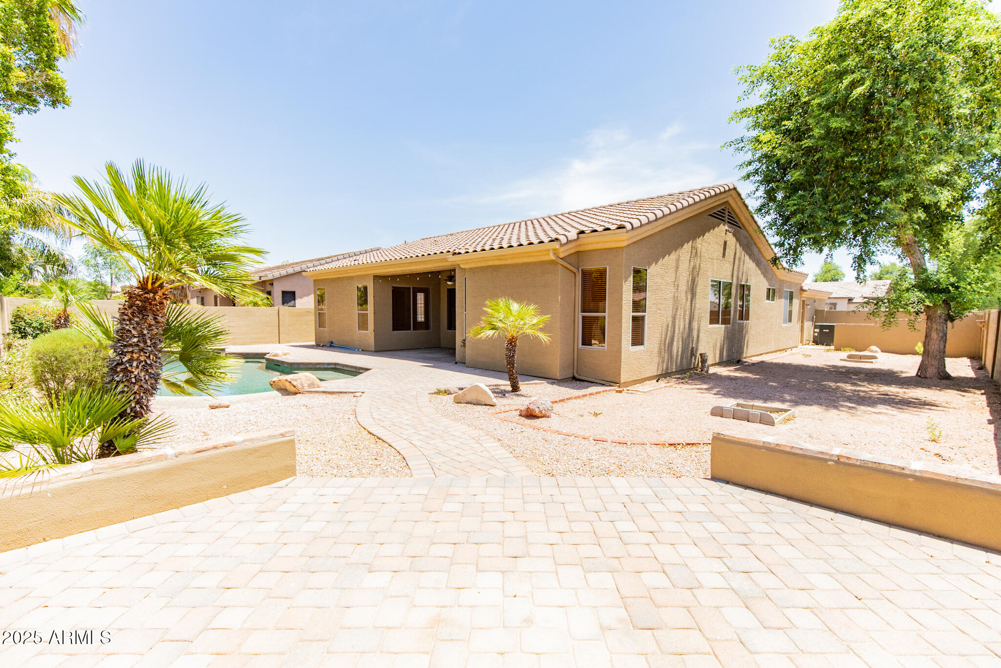 770 West Aloe Place Chandler, AZ 85248 - Photo 27 of 28 a view of a house with snow on the road