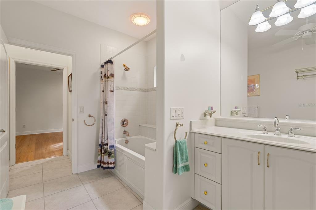 2736 Mayaguana Court Punta Gorda, FL 33950 - Photo 52 of 80 a spacious bathroom with a tub sink and mirror