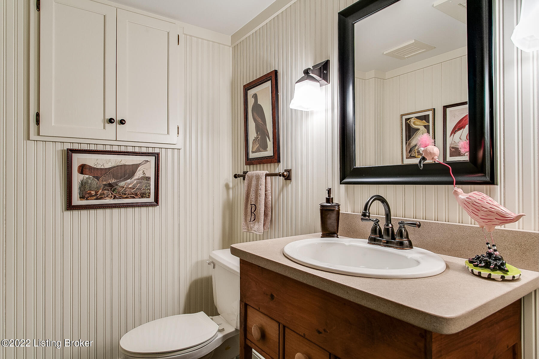 560 Sunset Road Louisville, KY 40206 - Photo 74 of 88 Lower level powder room just inside the door from the 2nd 2 car garage.