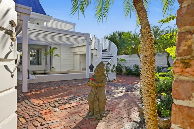 a large kitchen with stainless steel appliances lots of counter top space