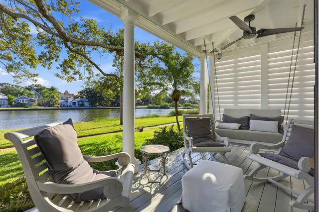 a bathroom with a sink mirror and vanity