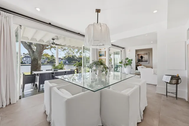 a view of living room kitchen with furniture and outdoor kitchen