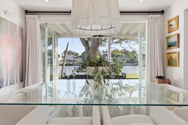 a view of hall way with furniture