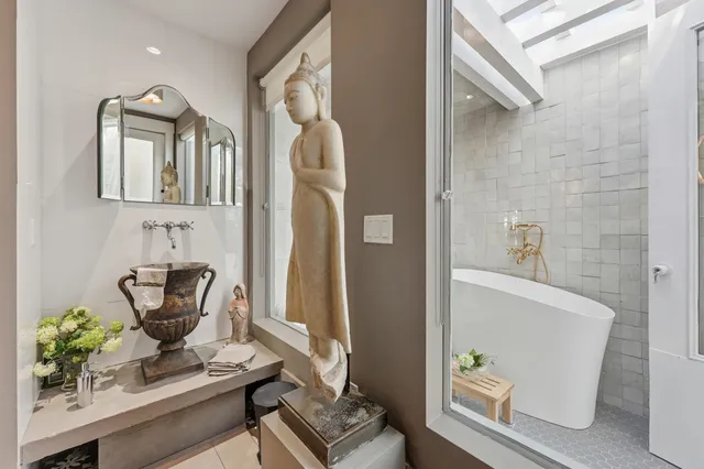 a view of a chairs and table in the balcony