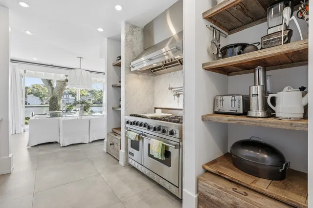 a living room with furniture fireplace and a flat screen tv