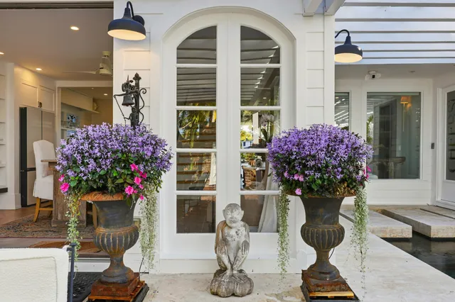 a kitchen with a sink and large window