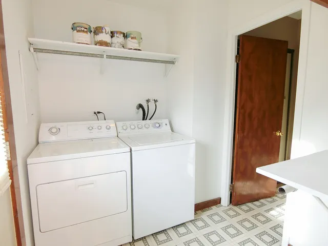 a utility room with dryer and washer
