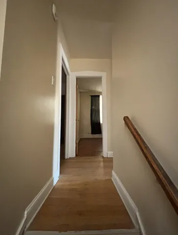 a bathroom with a toilet a sink and shower