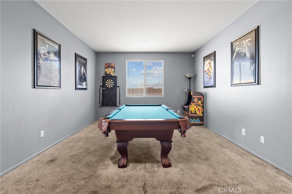 6949 Beale Road Palmdale, CA 93552 - Photo 12 of 32 a room with furniture and window