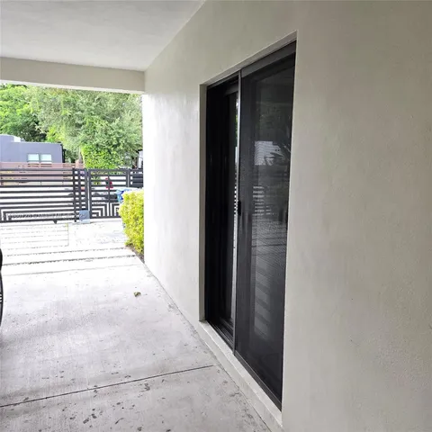 a view of a backyard of a house