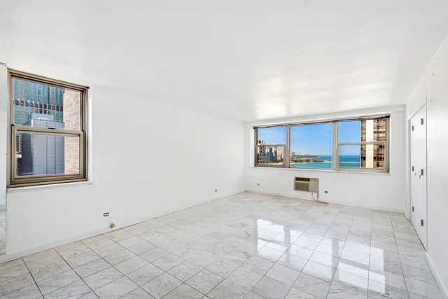 an empty room with windows