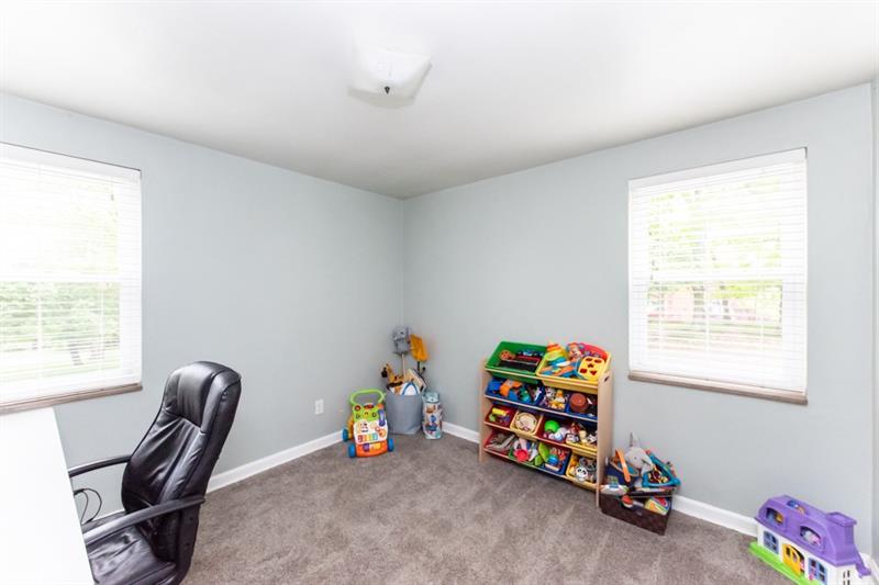 10089 Grubbs Road Wexford, PA 15090 - Photo 14 of 25 The 2nd bedroom is located on the main floor. It is currently being used as a play room/home office.