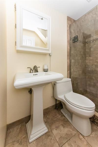 10089 Grubbs Road Wexford, PA 15090 - Photo 18 of 25 The 2nd floor full bath features a ceramic tile shower with seamless glass enclosure.