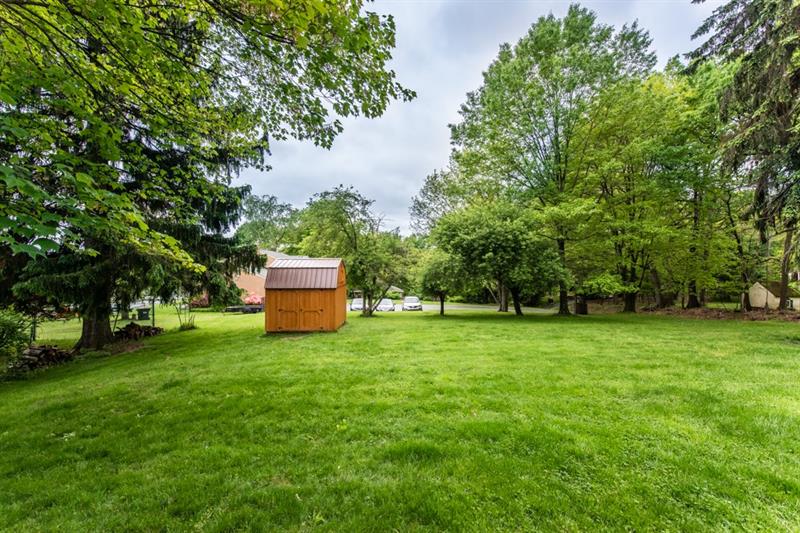 10089 Grubbs Road Wexford, PA 15090 - Photo 23 of 25 View of back yard from the deck showing the large storage shed.