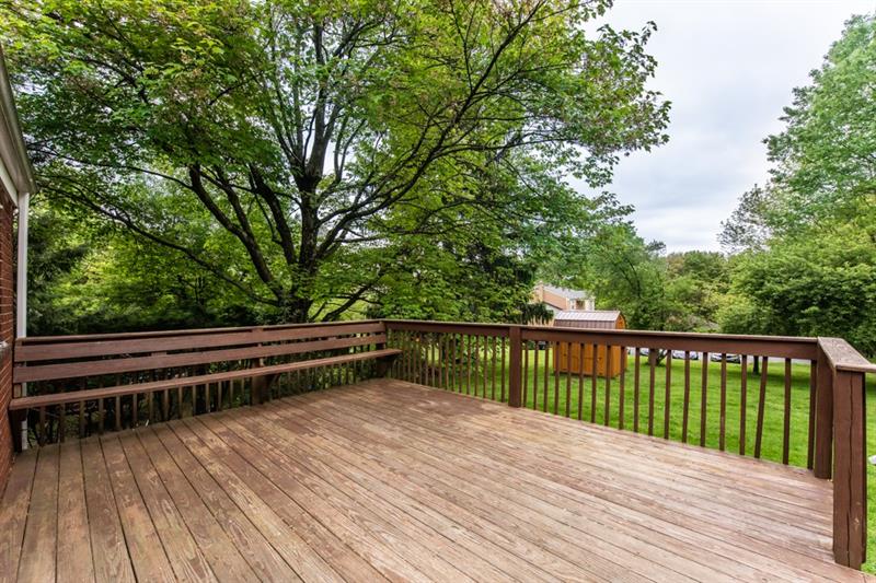 10089 Grubbs Road Wexford, PA 15090 - Photo 5 of 25 Step out of the dining room onto the large 17x14 wood deck with built in bench. The deck has been re-stained since this photo was taken.