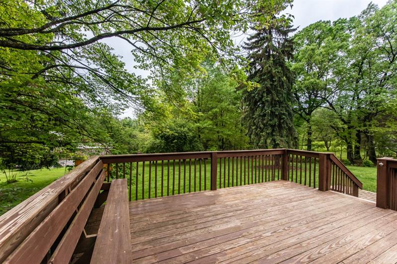 10089 Grubbs Road Wexford, PA 15090 - Photo 6 of 25 Alternate view of 17x14 deck showing access to back yard. The deck has been re-stained since this photo was taken.