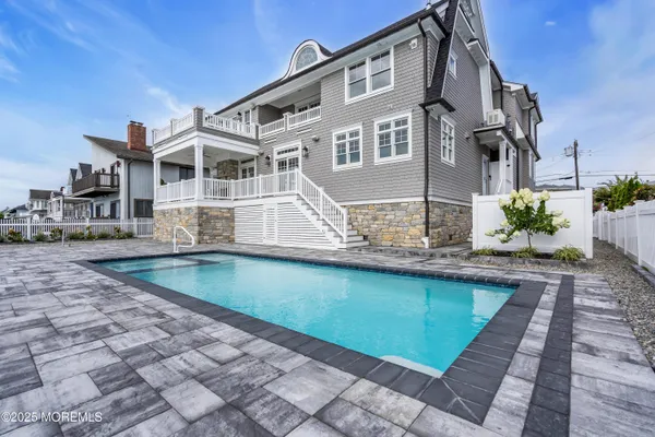 a view of staircase with white walls and stair