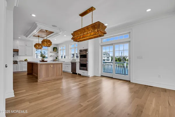 a view of a lake with boats and a bridge