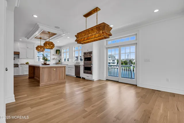 a view of a lake with boats and a bridge