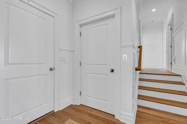 a bathroom with a shower and a sink