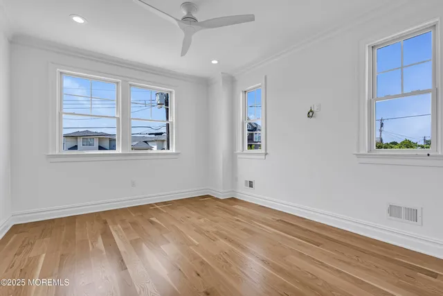 a front view of a house with a lake view