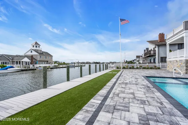 a view of entryway with wooden floor and stairs