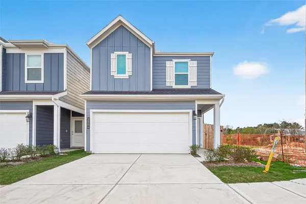 a front view of house with yard