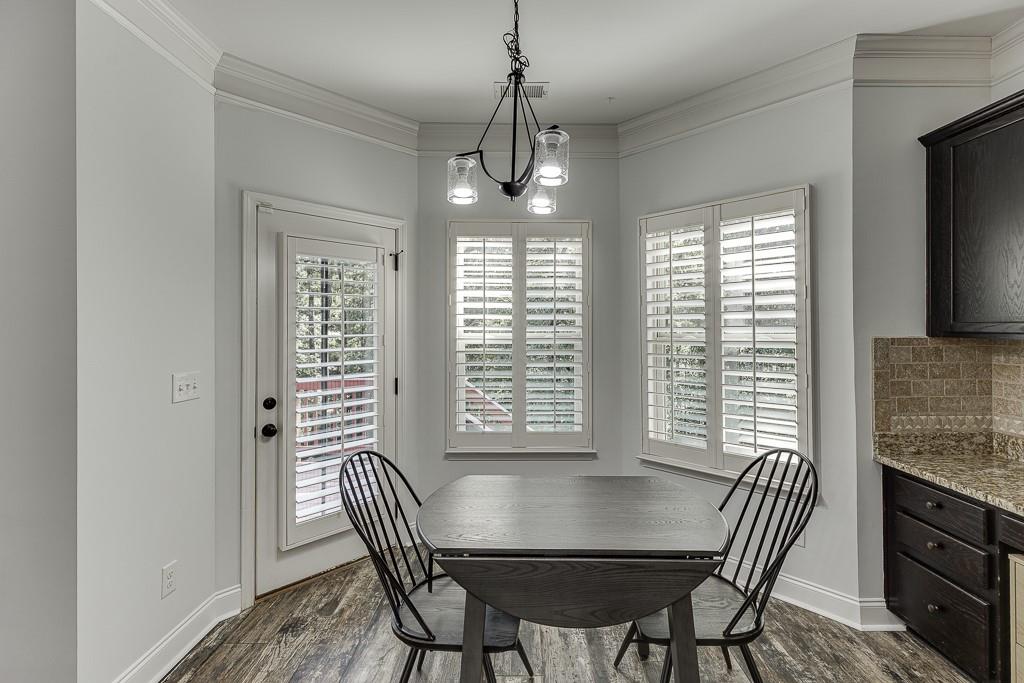 2858 Shadowstone Way Winder, GA 30680 - Photo 14 of 52 a view of a dining room with furniture window and outside view