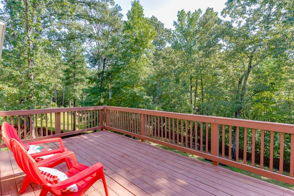 2858 Shadowstone Way Winder, GA 30680 - Photo 43 of 52 a balcony with wooden floor and city view