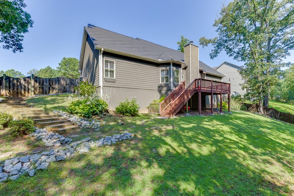 2858 Shadowstone Way Winder, GA 30680 - Photo 45 of 52 a house view with a garden space