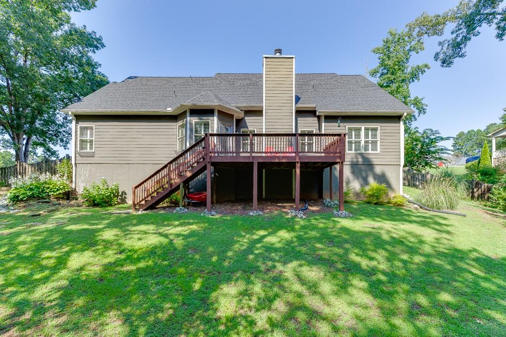 2858 Shadowstone Way Winder, GA 30680 - Photo 46 of 52 a house view with a garden space