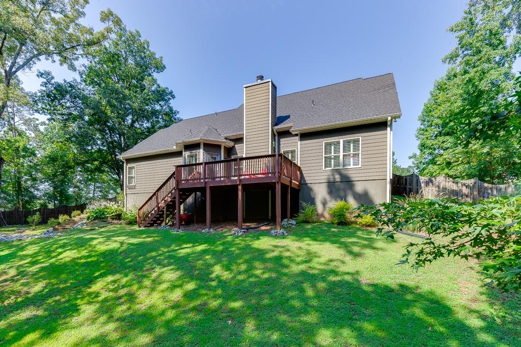2858 Shadowstone Way Winder, GA 30680 - Photo 47 of 52 a front view of house with yard and green space