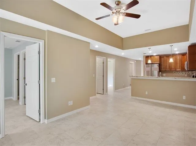 a view of a kitchen with a sink and cabinet area