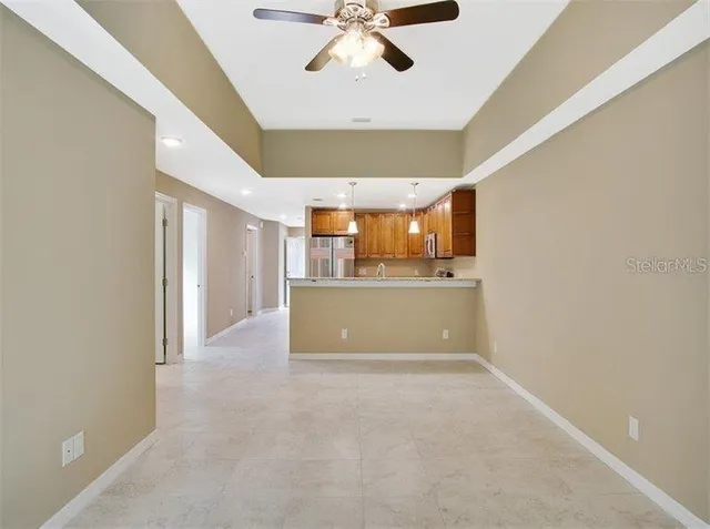 a view of a kitchen with a sink and cabinet area