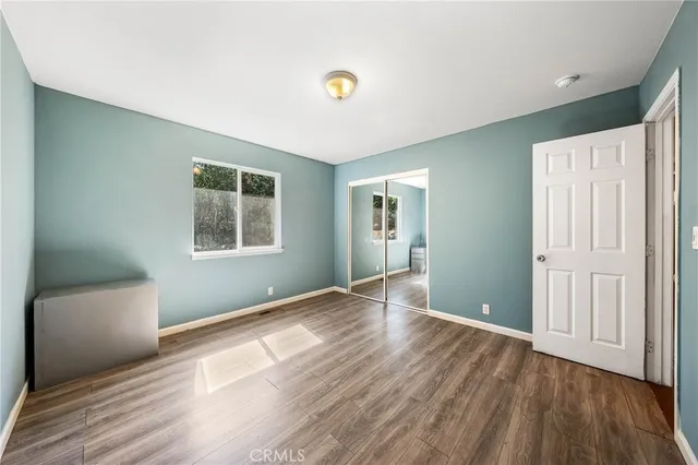 a view of livingroom with hardwood floor and window