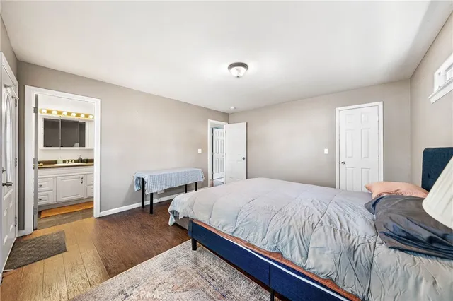 a bedroom with a bed and furniture