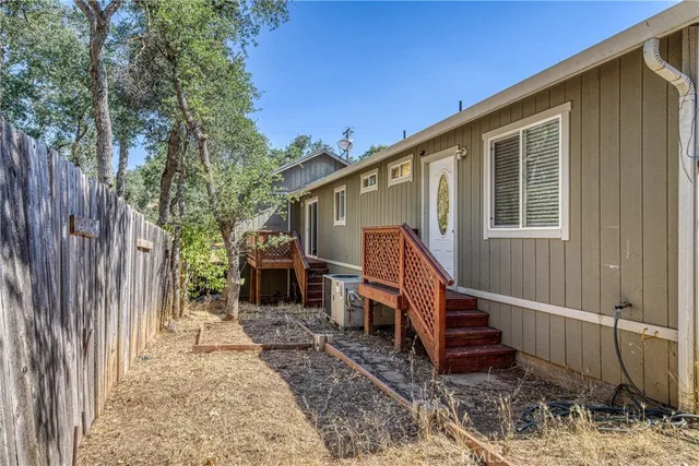 a house view with a backyard space