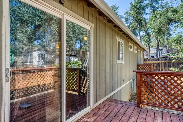 a balcony view with a glass door