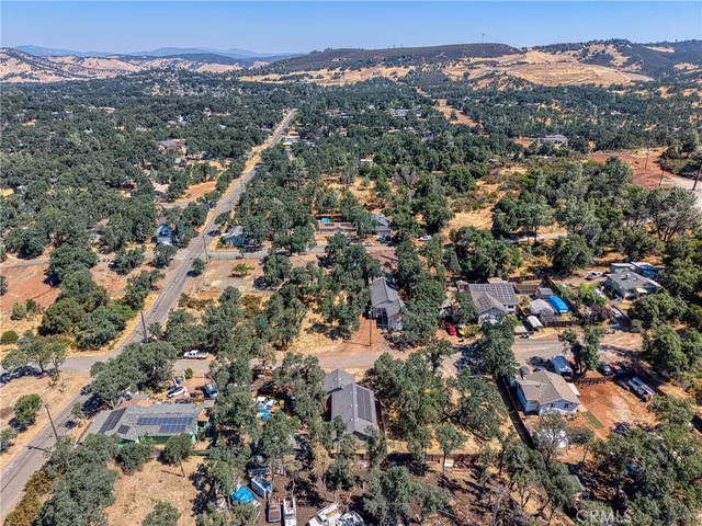 an aerial view of a city with lots of residential buildings
