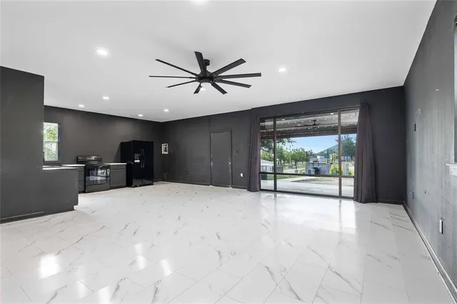 a view of a livingroom with a flat screen tv