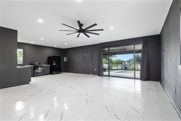 a view of a livingroom with a flat screen tv