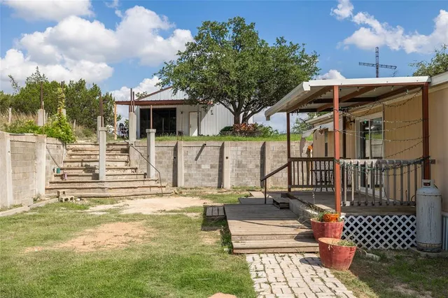 a house view with a garden space